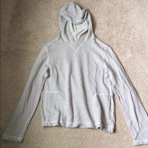 Fun and edgy! Love this striped hoody with pocket.